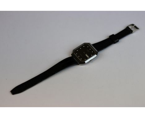 Rado DiaStar ladies wristwatch, the black dial with date aperture and eleven small round eight cut diamonds forming the marke