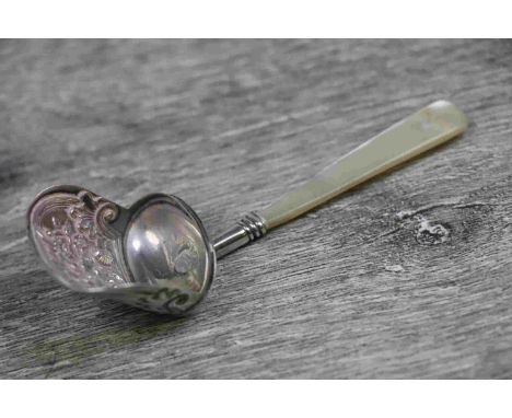 George III silver and mother-of-pearl handled caddy spoon of coal scoop form, the bowl with repousse floral decoration, maker