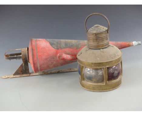 Brass four way ship's lamp and a Minimax fire extinguisher with bracket