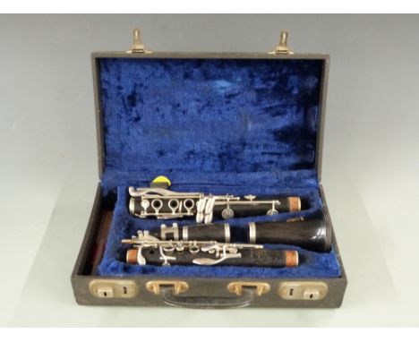 Boosey and Hawkes rosewood clarinet with nickel keys, 312530 stamped to body, in original case 