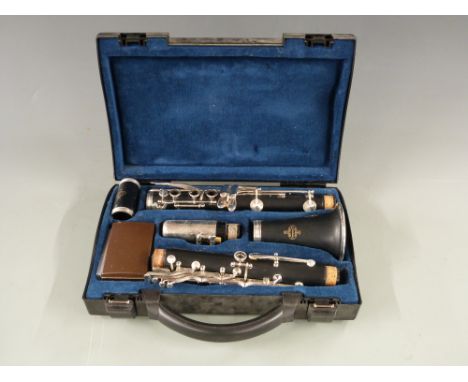 Buffet of Paris B12 cased clarinet in case, composite body, silvered fittings and original receipt, reg no 721996