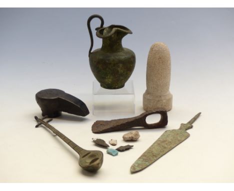 Quantity of ancient and Oriental style items including arrow heads, axe head, Islamic oil lamp etc