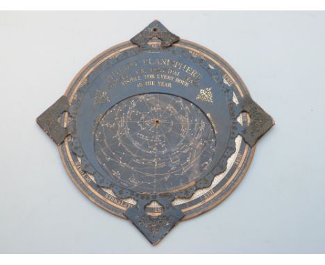 Vintage Philips Planisphere showing the principal stars visible for every hour in the year with embossed and gilt leather dia