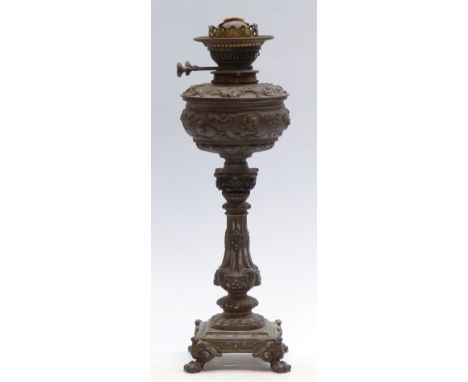 A 19th / 20thC cast metal oil lamp with Messengers no 2 patent Duplex burner
