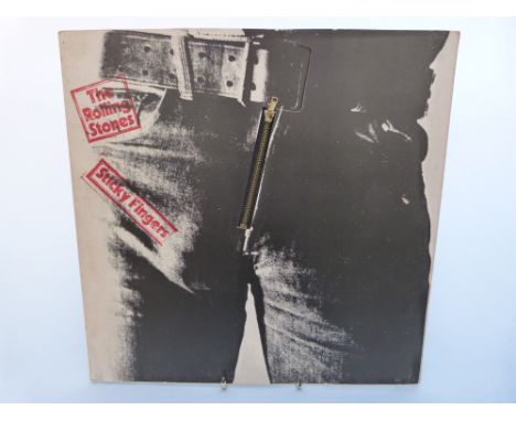 The Rolling Stones - Sticky Fingers (CUN 59100). Record and cover appear EX with square zipper including insert