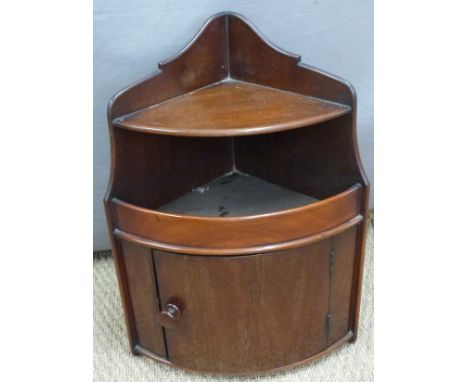 Small bow fronted 19thC/ 20thC corner cupboard with shelf above, height 52cm