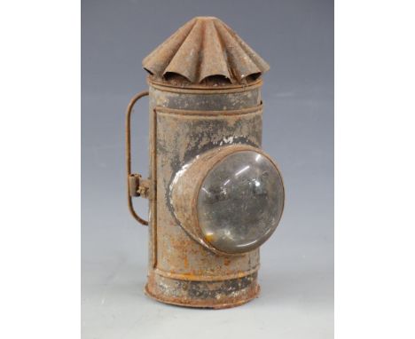 A police or similar hand lamp with fluted top 