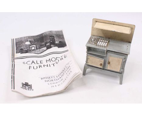 A Bassett Lowke Ltd scale model furniture lead hollow cast model of No. 8351 model gas cooker, comprising of grey and cream h