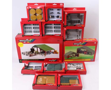 A collection of 14 various boxed Britains 1/32 scale farm building and accessory sets to include No. 40973 Farm Buildings set