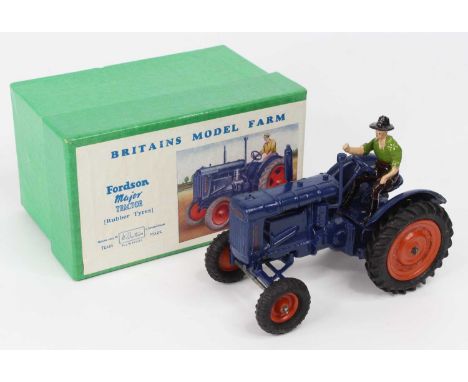 Britains, 128F, Fordson Major tractor with driver, dark blue body, orange wheels and black rubber tyres, with driver, in orig