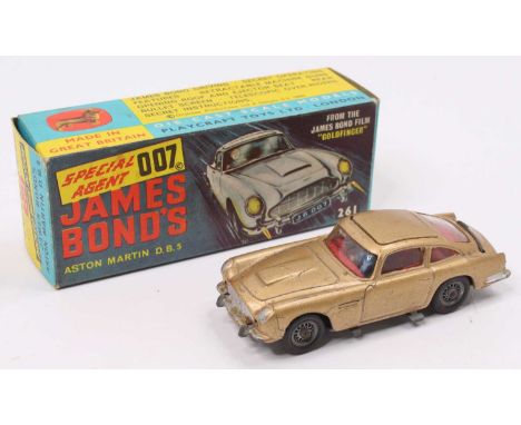 Corgi Toys No. 261 James Bond's Aston Martin DB5, metallic gold body, with wire wheels, all mechanisms in working order, the 