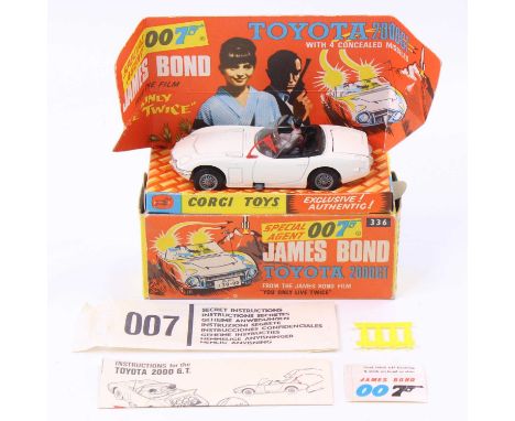 Corgi Toys No. 336 James Bond's Toyota 2000 GT comprising of a white body with black interior, and one figure - James Bond is