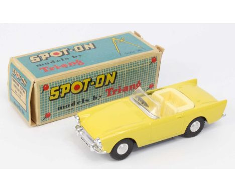 Spot-On No.191 Sunbeam Alpine Sports Car, yellow body, pale cream interior and steering wheel, chrome front and rear bumpers,