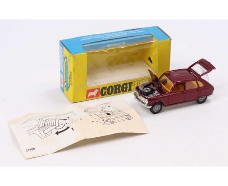 Corgi Toys No. 260 Renault 16 comprising of maroon body with yellow interior and cast hubs, comes with the original plastic s