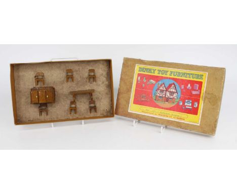 Dinky Toys No.101 Pre War Dining Room set in box ,consists of the following : 6 chairs and one table plus sideboard, all stil