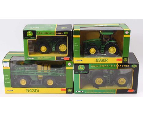 A collection of four various boxed Britains 1/32 scale John Deere farming implements and tractor diecast vehicles to include 