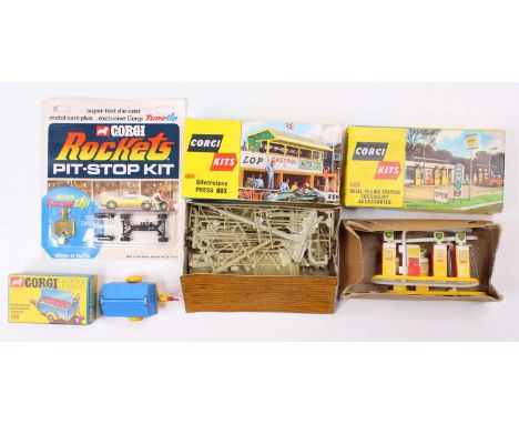 Corgi Toys mixed boxed accessory group comprising a Corgi Rockets Pit Stop kit, Corgi Kits No. 604 Silverstone Press Box, No.