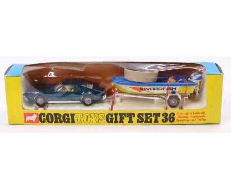 Corgi Toys Gift Set 36 Oldsmobile Toronado and Speedboat set comprising No.276 Oldsmobile Toronado in dark metallic blue with