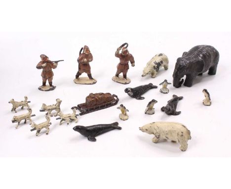 A Timpo lead hollow cast Arctic Hunting Set comprising 3 standing hunter figures, Sled, Huskies, Seals, Penguins, and other f