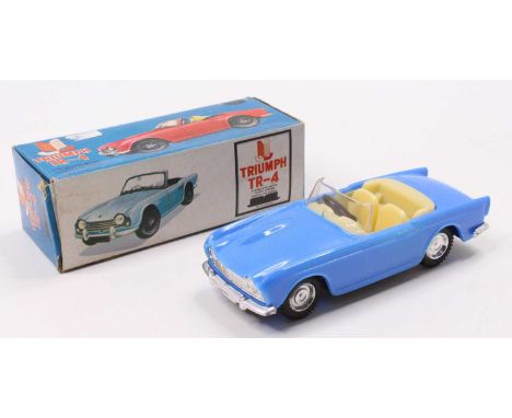 C H Toys Hong Kong plastic friction drive Triumph TR4 Sports Car with its original card box