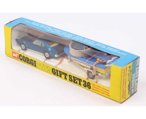 Corgi Toys Gift Set 36 Oldsmobile Toronado and Speedboat set comprising No.276 Oldsmobile Toronado in dark metallic blue with