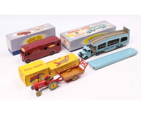 Dinky Toys boxed model group of 4 comprising No. 300 Massey Harris Tractor, No. 320 Harvest Trailer, No. 981 Horsebox, and No