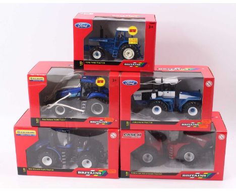 A collection of Britains 1/32 scale boxed tractors to include a Case IH 600 four-wheel drive Stiga tractor, a New Holland T9.