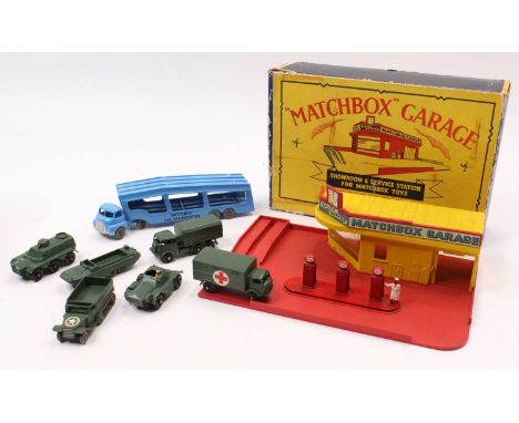 A Matchbox Lesney MG1 Garage and Showroom in the usual specification of yellow and red, with a set of ESSO petrol pumps, the 
