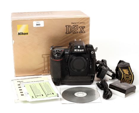 Nikon D2X Digital SLR Camera Body. (condition 5E) with battery (no charger) cables etc, in makers box. Shutter count not know