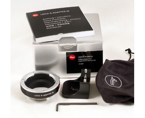 Leica R-Adapter M (Leitz code 14642). Allows use of Leica R series lenses on Leica M cameras. With pouch, instructions etc in