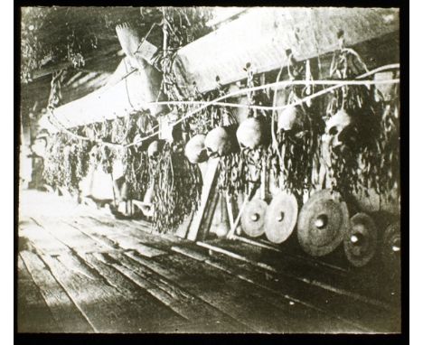Group of Eight Magic Lantern Slides Featuring The Dajak Head-hunters of Borneo. Each in a protective sleeve and titled in Dut