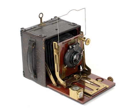 A Good Thornton Pickard Folding Ruby 1/4 Plate Wood &amp; Brass Camera. (condition 5F).