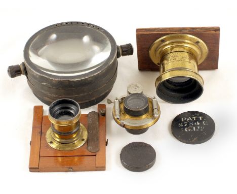 Brass Ross Lens for Whole Plate Camera. Plus a small, un-named brass lens, with panel and front standard, Beck lens in Bausch
