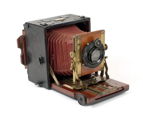 An Uncommon Gandolfi 'Universal' Quarter Plate Camera. Fitted with an Aldis-Butcher 5.5 inch f4.5 lens in a Compur shutter. B