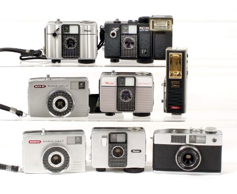 Seven Ricoh Half Frame Cameras. Comprising Ricoh Auto Half (battery leakage damage); Auto Half SE; Auto Half E (not firing); 
