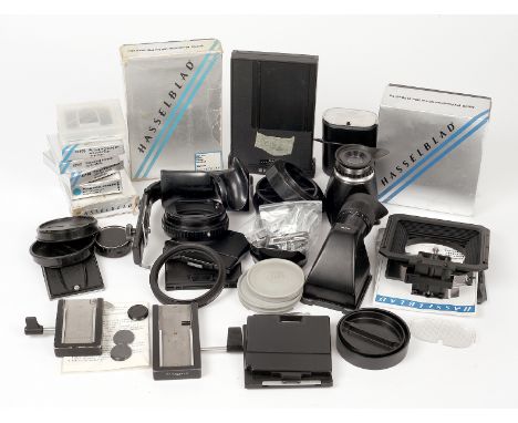 A Good Selection of Hasselblad Accessories. To include two Waist Level Finders, Pro Lens Shade in makers box, filters, Polaro