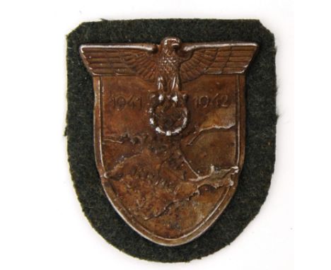 KRIM: A German Krim 1941-42 shield / patch. Detailed to front ' Krim ' with date.