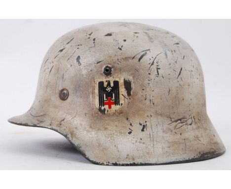 THIRD REICH RED CROSS: An original WWII Second World War era Third Reich Nazi Red Cross / medics helmet. With red cross emble