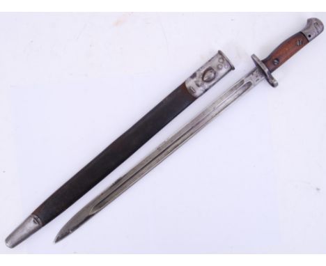 BAYONET: A 1907 pattern German rifle bayonet, with scabbard. Original wooden grips with crown makers mark to hilt. 56cm long.