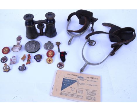 MILITARIA: A collection of items to include a pair of vintage opera glasses, a commemorative spoon for HMS Fisguard, various 