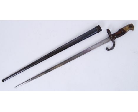 BAYONET: An antique French 19th century Gras rifle bayonet - the blade stamped for 1882. With scabbard. 