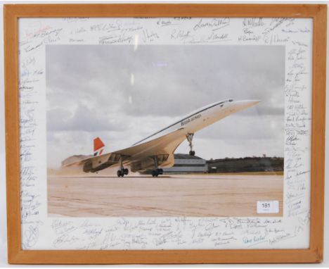 CONCORDE: An original 1970's Concorde framed and glazed print, the central image taken during a takeoff. The border of the ph