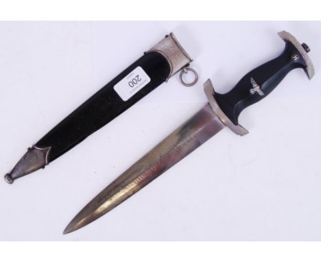 SS DAGGER: An original WWII Second World War era Nazi SS Dagger. Decorated with the SS emblem to handle ( silver ), with orig