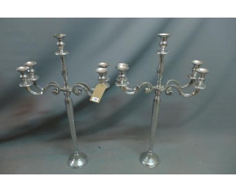 A pair of large chrome five light candelabras. H.99cm 