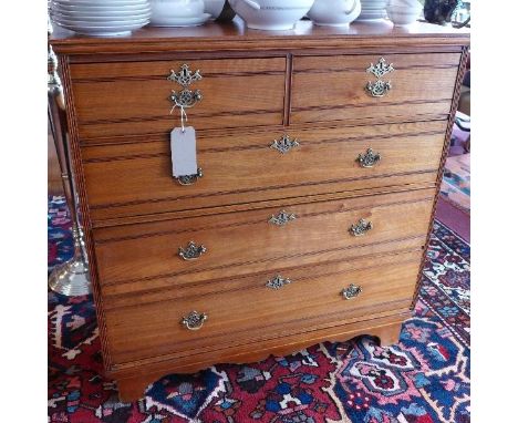 A Victorian walnut chest of two short over three long drawers raised on bracket feet. H-108 W-106 D-56 cm 