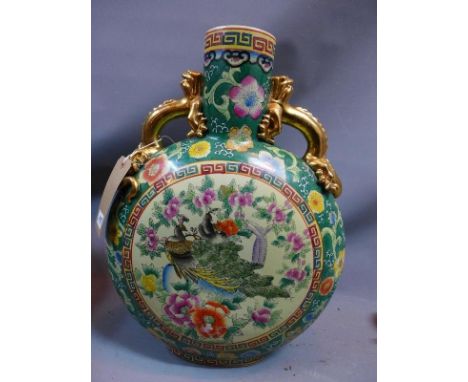 A 20th century Chinese ceramic moon flask vase with floral decoration. H-51cm 