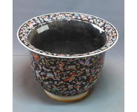 A Chinese ceramic jardiniere decorated with butterflies on a black ground. H-33 Diameter-48cm 