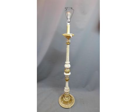 A 1930's floral carved standard lamp 