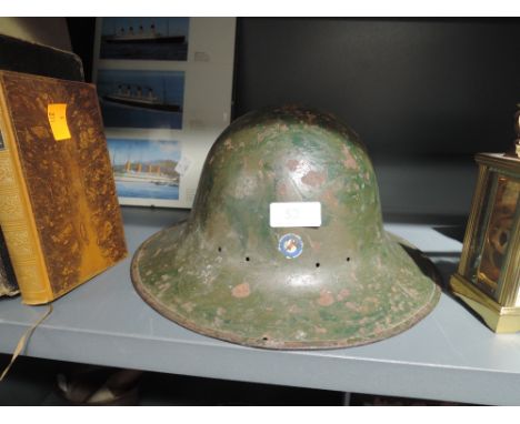 A genuine vintage military metal helmet