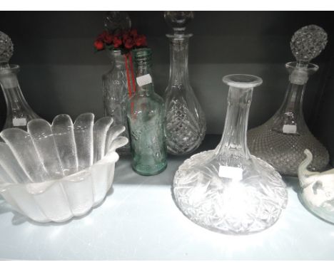 A selection of crystal glass wares including decanters